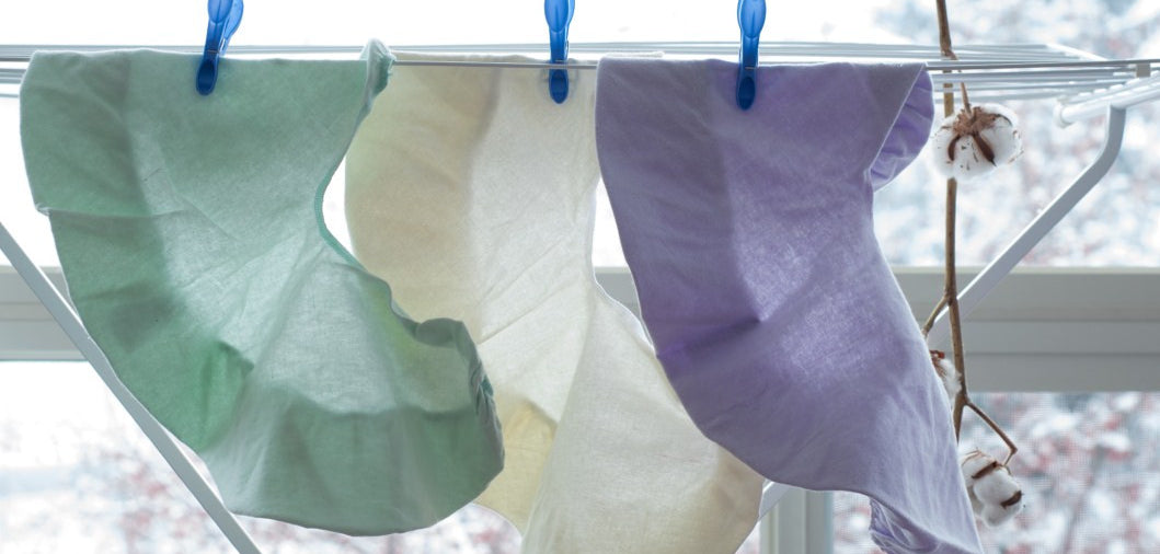 Massage face cradle cover set in polycotton hanging on a clothesline