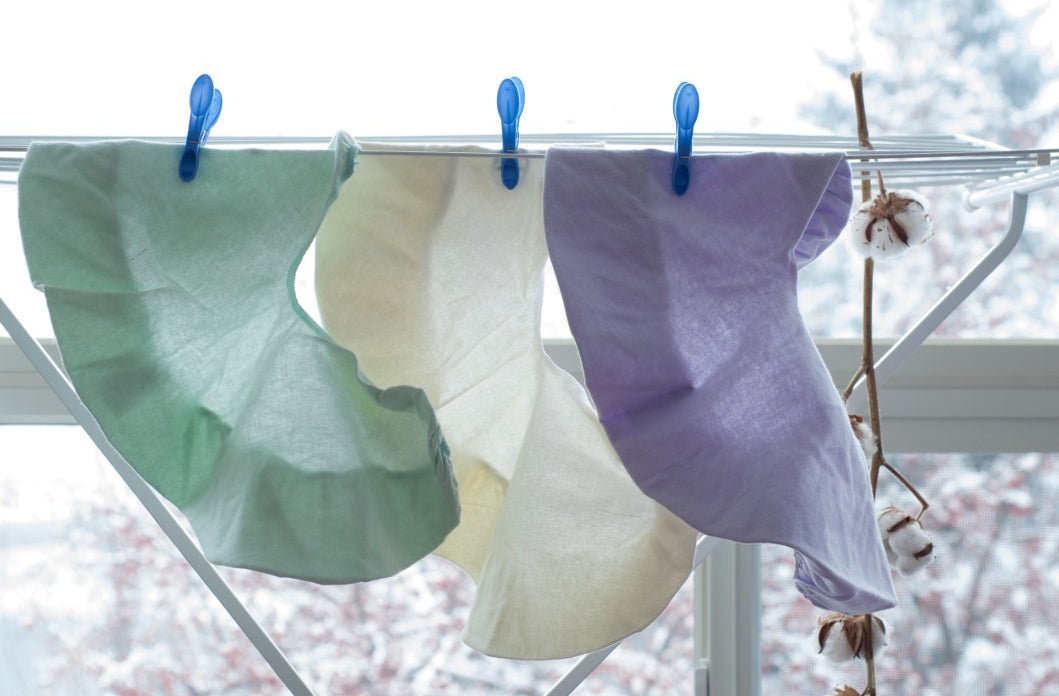 Massage face cradle cover set in polycotton hanging on a clothesline