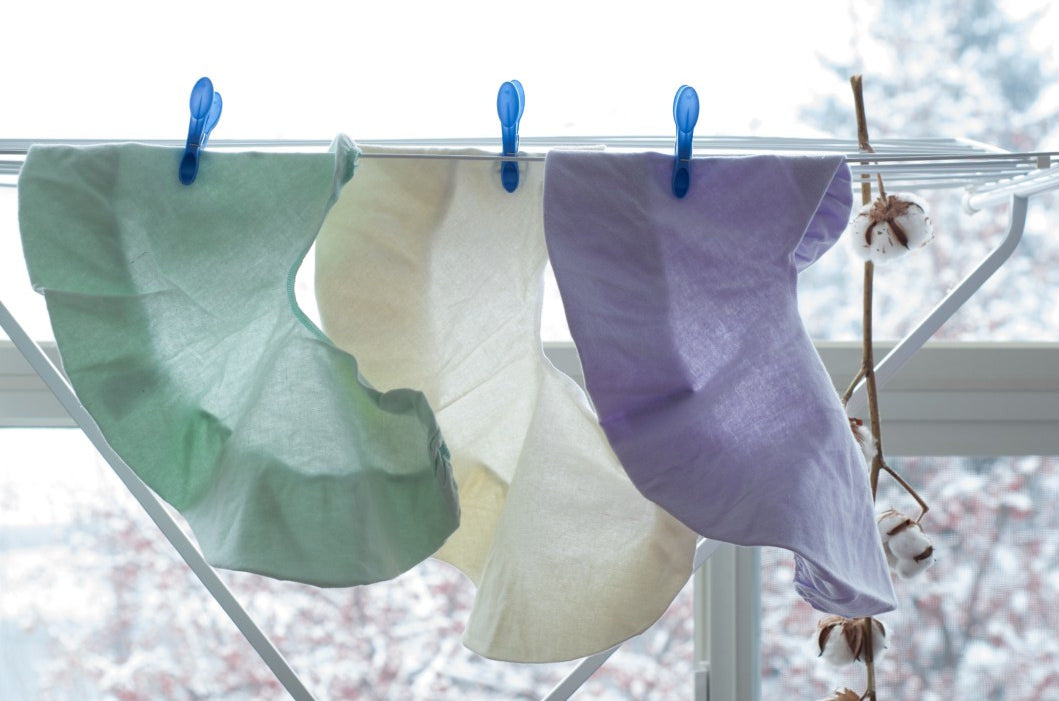 Massage face cradle cover set in polycotton hanging on a clothesline