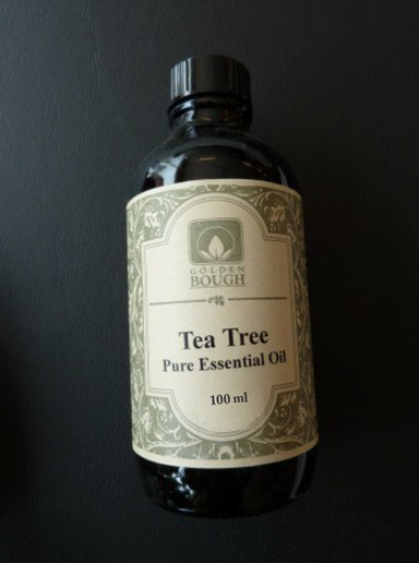 pure tea tree essential oil in 100 ml brown glass bottle