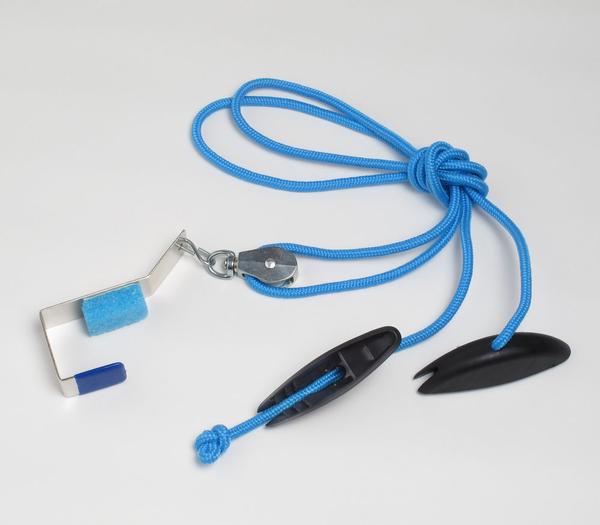 Shoulder pulley for rehabilitation. Blue rope, over-door pulley to strengthen shoulder and increase range of motion